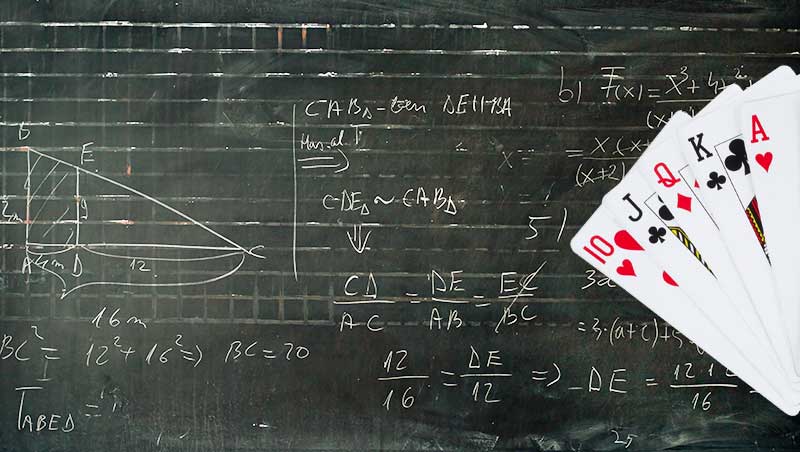 Playing card on a blackboard